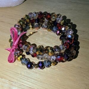 Handmade Beaded Bracelet Set with Red Ribbon Accent